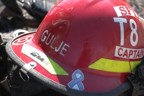 red firefighter helmet with name marked gulag